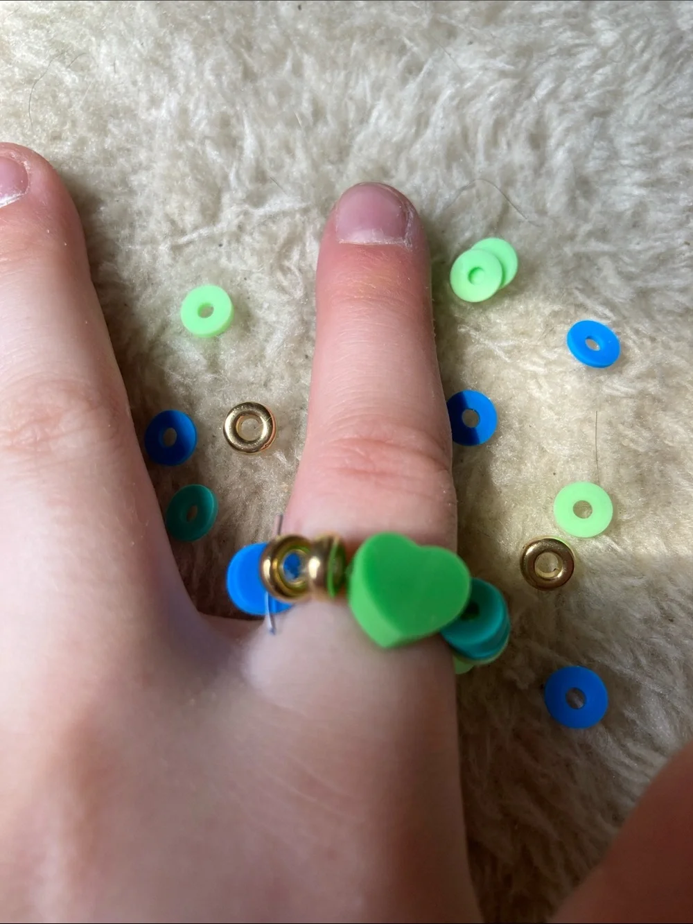 Green baby ring